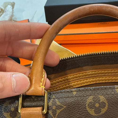 Speedy 25 Brown Top Handle Bag in Monogram Coated Canvas, Gold hardware