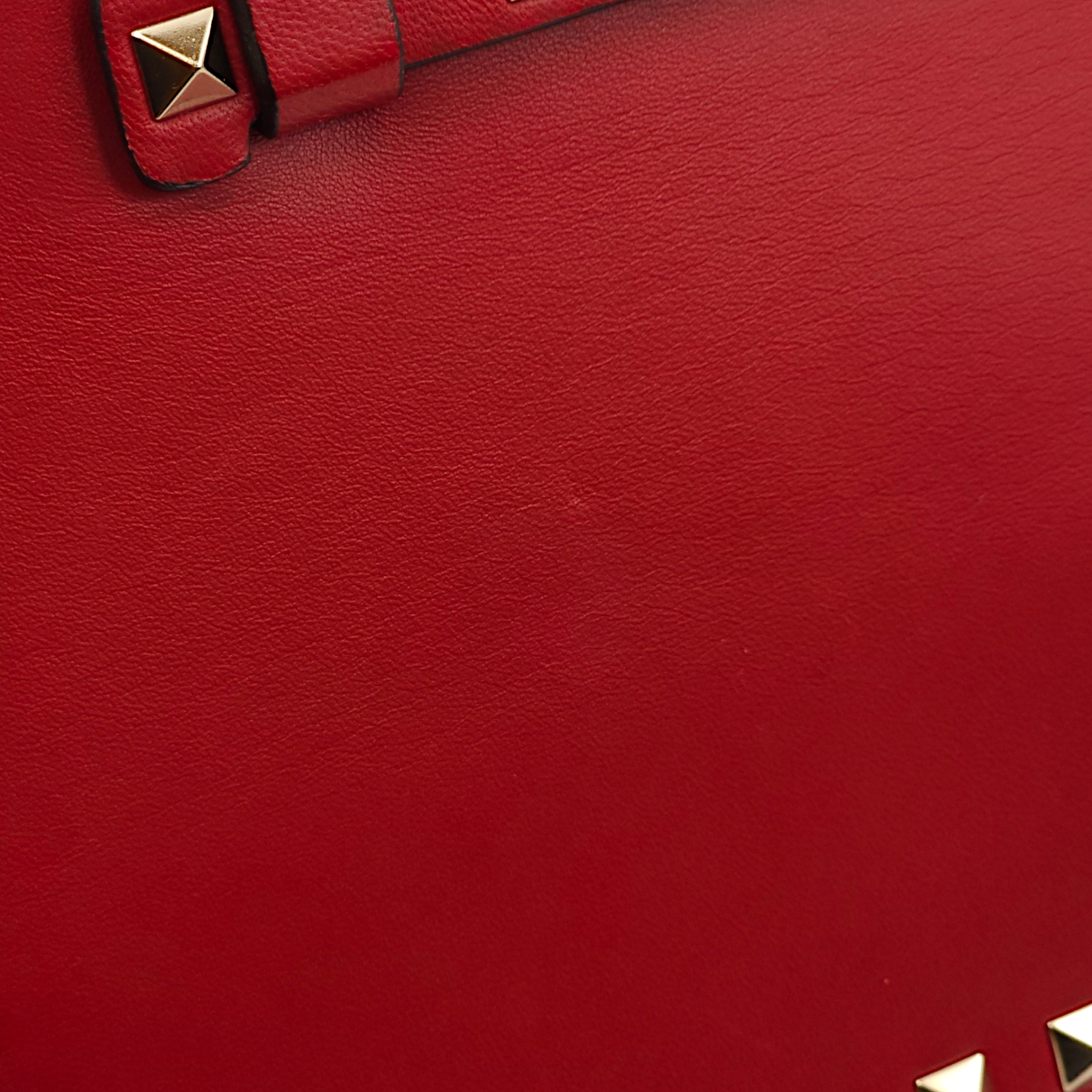 Studded Wristlet Red Clutch in Lambskin, Gold hardware