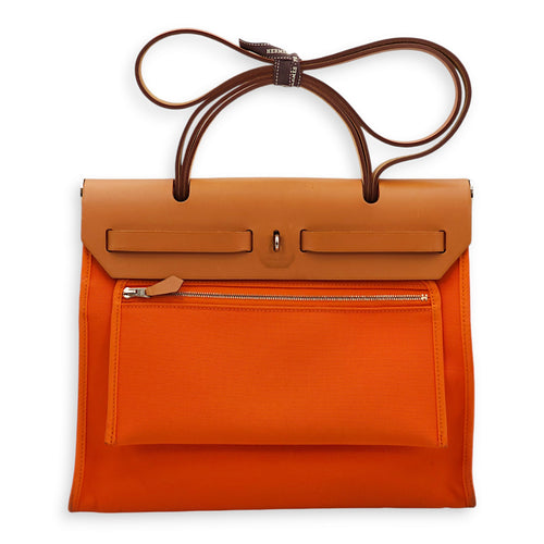 Herbag 31 Orange in Toile/Vache Hunter, Palladium hardware