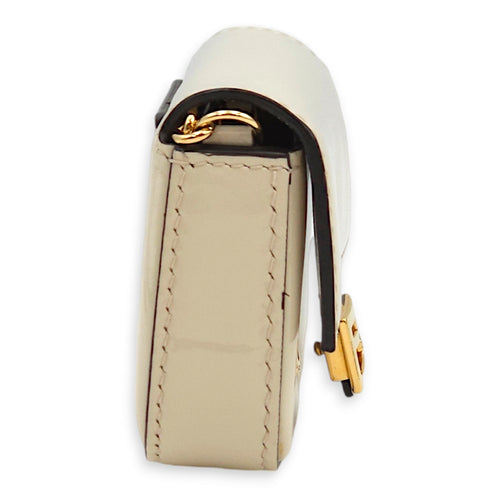 Nano Baguette Belt bag Cream Charm in Patent Leather, Gold hardware