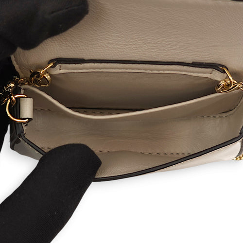 Nano Baguette Belt bag Cream Charm in Patent Leather, Gold hardware