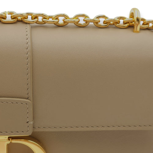 Montaigne East West Chain Flap Beige Crossbody Bag in Calfskin, Gold hardware