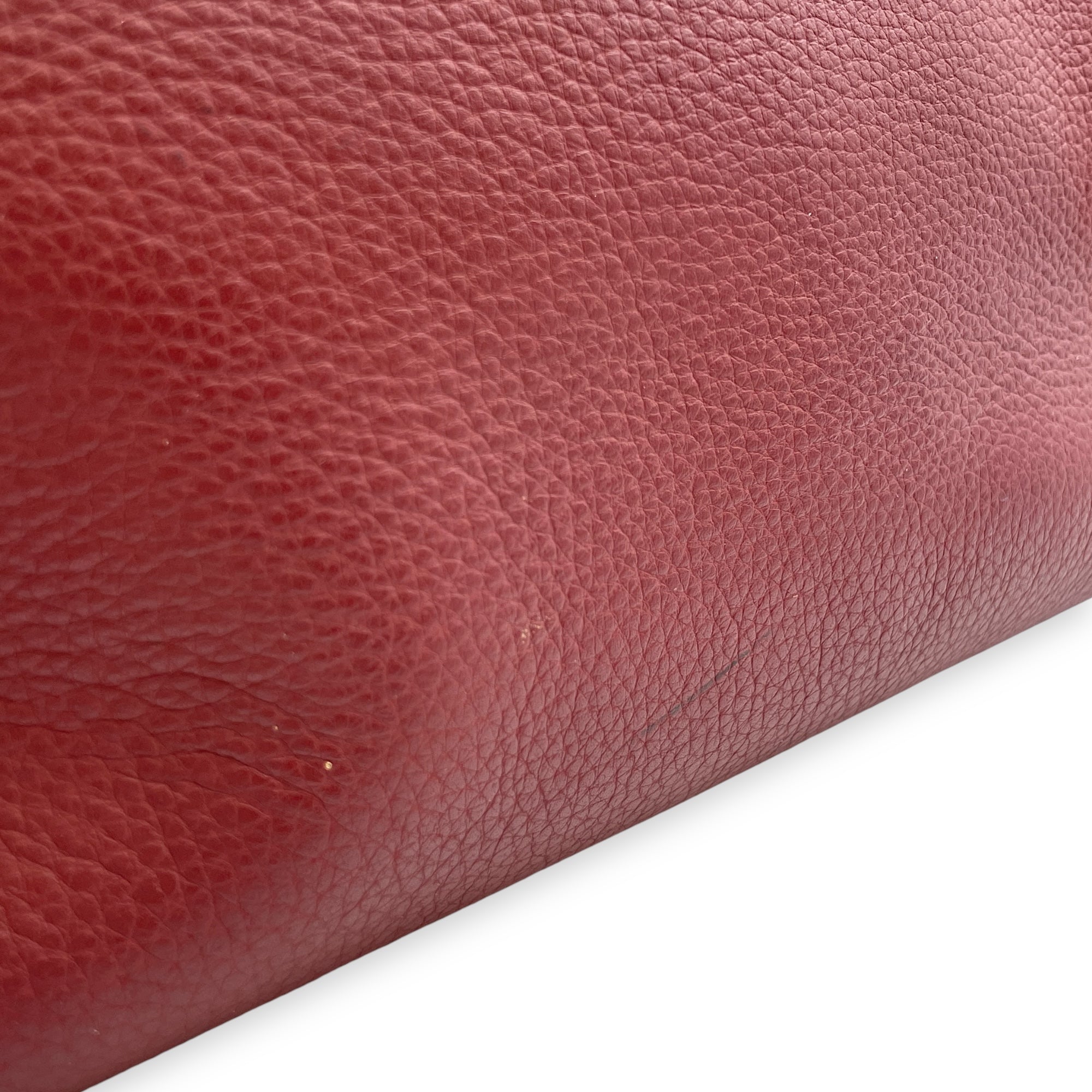 Kelly 35 Rouge H in Clemence Palladium hardware