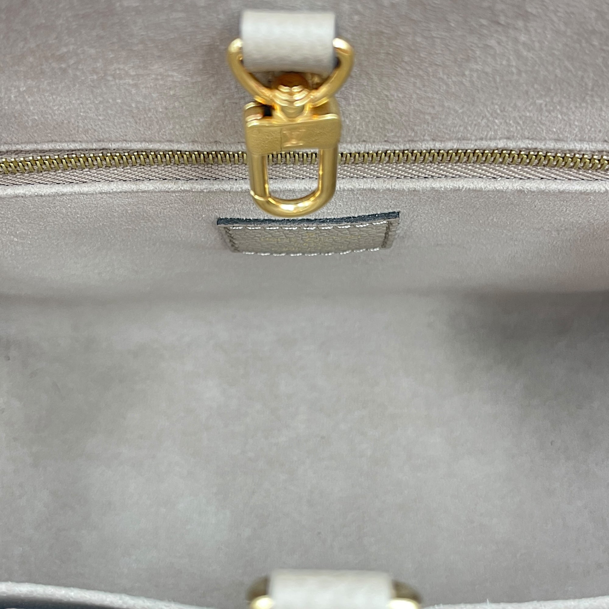 On-The-Go PM Tourterelle Top Handle Bag in Empriente Leather, Gold hardware