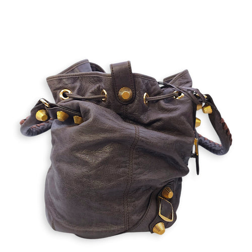 Pompon Large Dark brown Top Handle Bag in Distressed Leather, Gold hardware