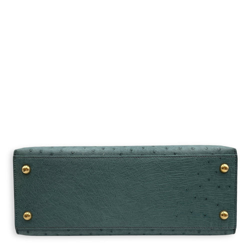 Dalvy 30 Blue Jean in Ostrich Gold hardware