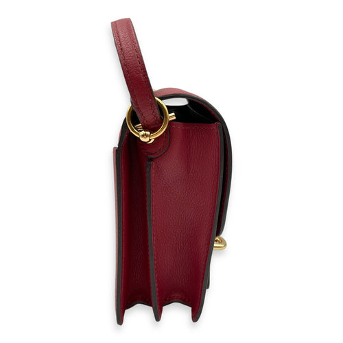 Roulis Mini Rouge Grenat in Evercolor, Permabrass hardware
