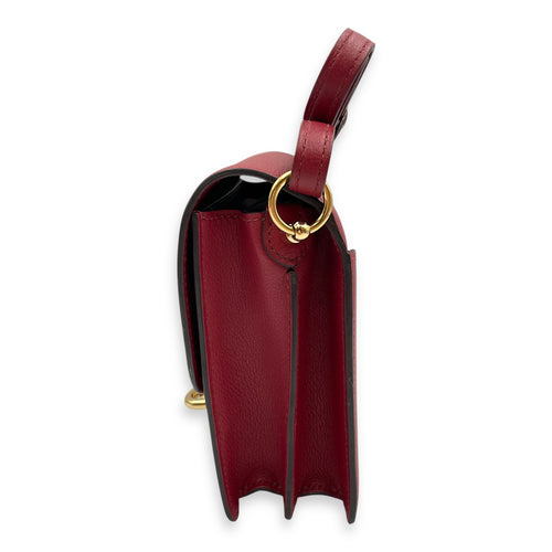 Roulis Mini Rouge Grenat in Evercolor, Permabrass hardware