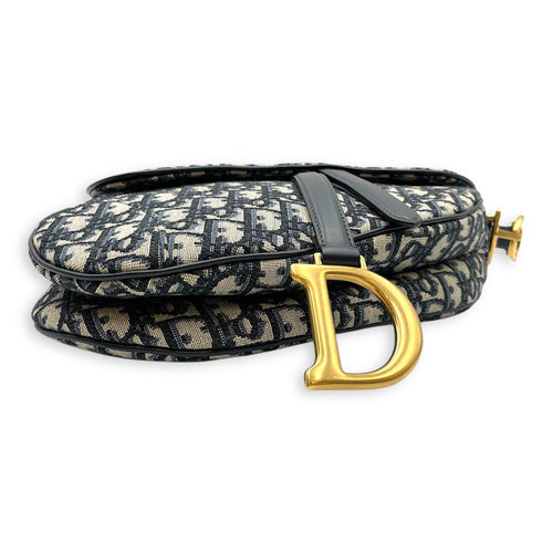 Oblique Saddle Blue Top Handle Bag in Canvas, Gold hardware