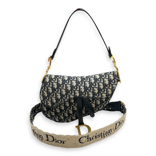 Oblique Saddle Blue Top Handle Bag in Canvas, Gold hardware