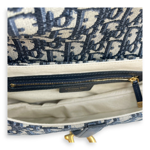Oblique Saddle Blue Top Handle Bag in Canvas, Gold hardware