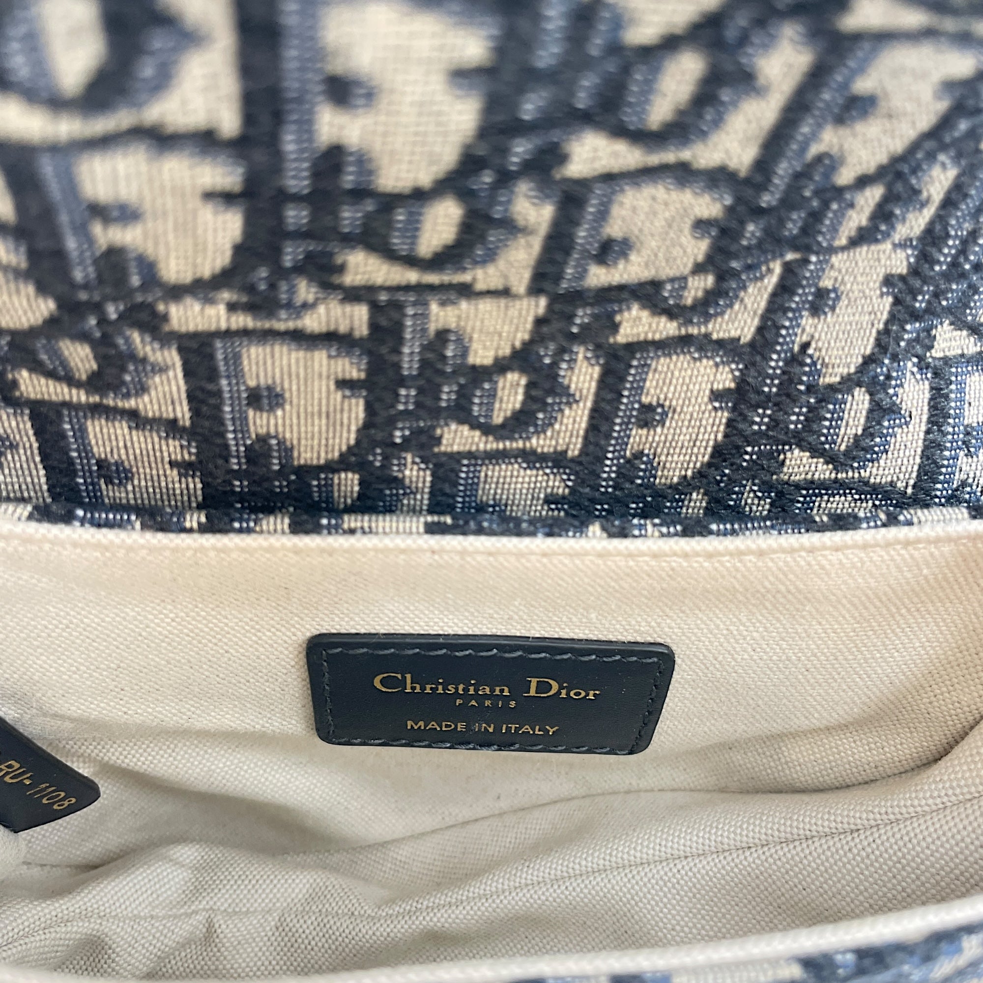 Oblique Saddle Mini Blue Top Handle Bag in Canvas, Gold hardware