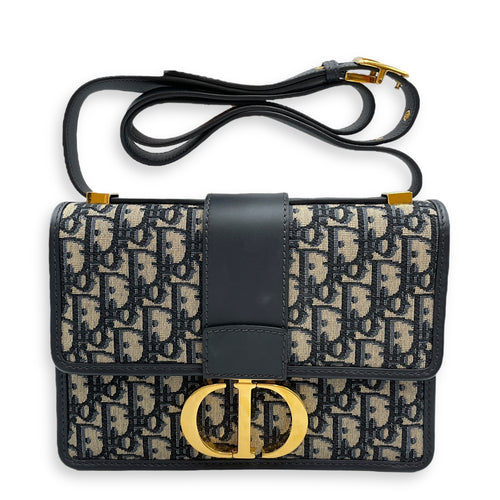 Oblique Montaigne 24cm Blue Crossbody Bag in Canvas, Gold hardware