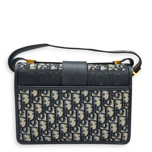 Oblique Montaigne 24cm Blue Crossbody Bag in Canvas, Gold hardware
