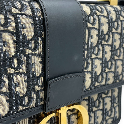 Oblique Montaigne 24cm Blue Crossbody Bag in Canvas, Gold hardware