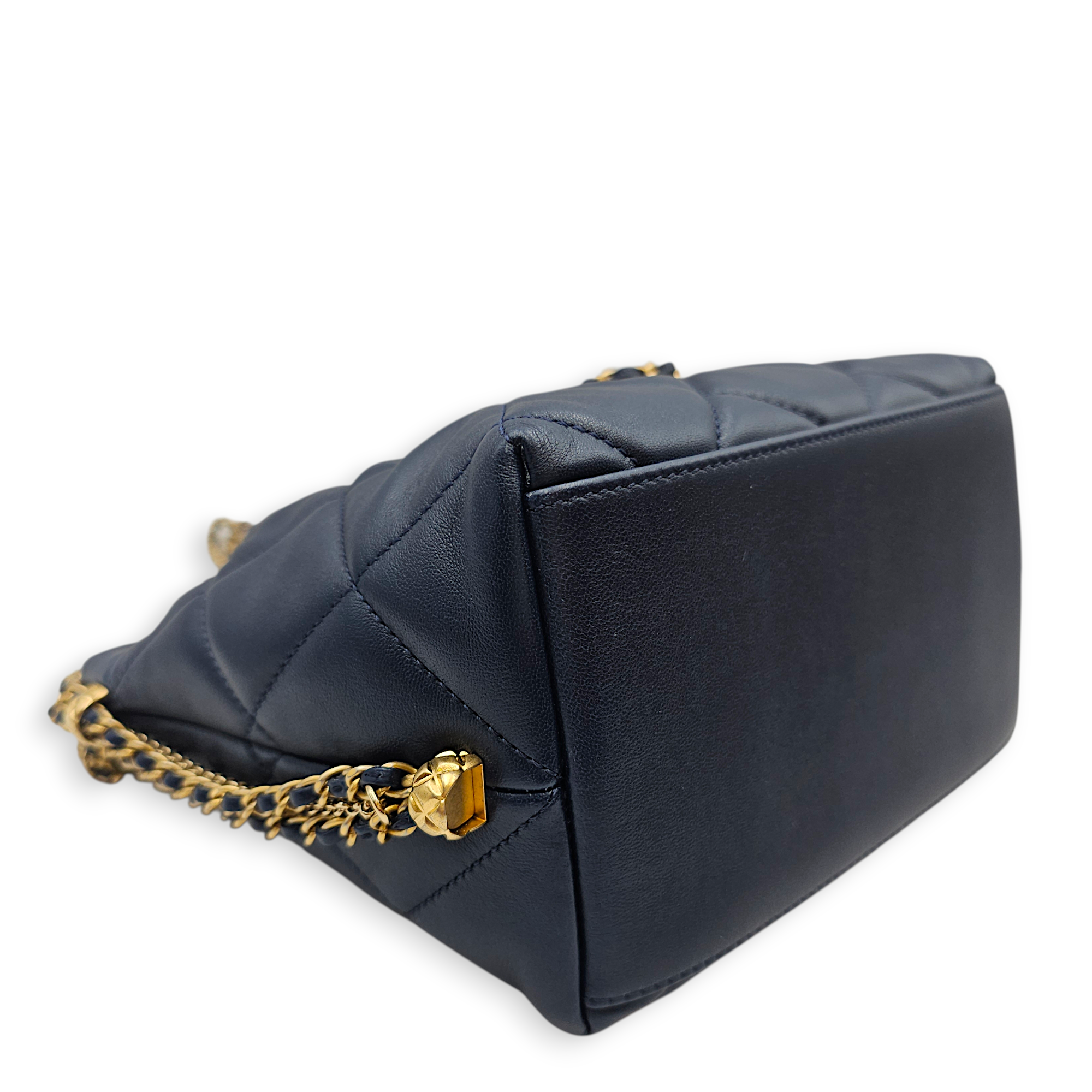 CC Drawstring Bucket Navy Blue Crossbody Bag in Lambskin, Pearl/Gold hardware