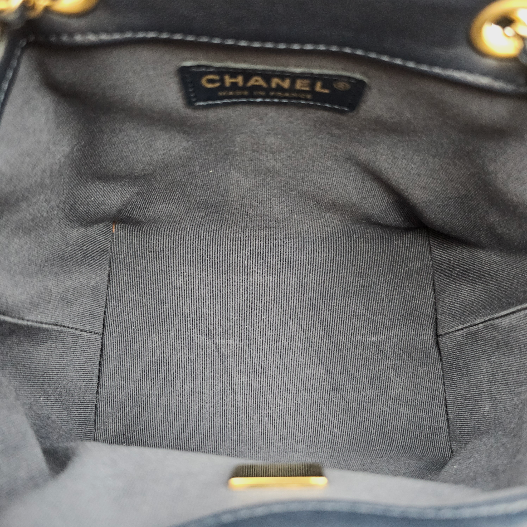 CC Drawstring Bucket Navy Blue Crossbody Bag in Lambskin, Pearl/Gold hardware