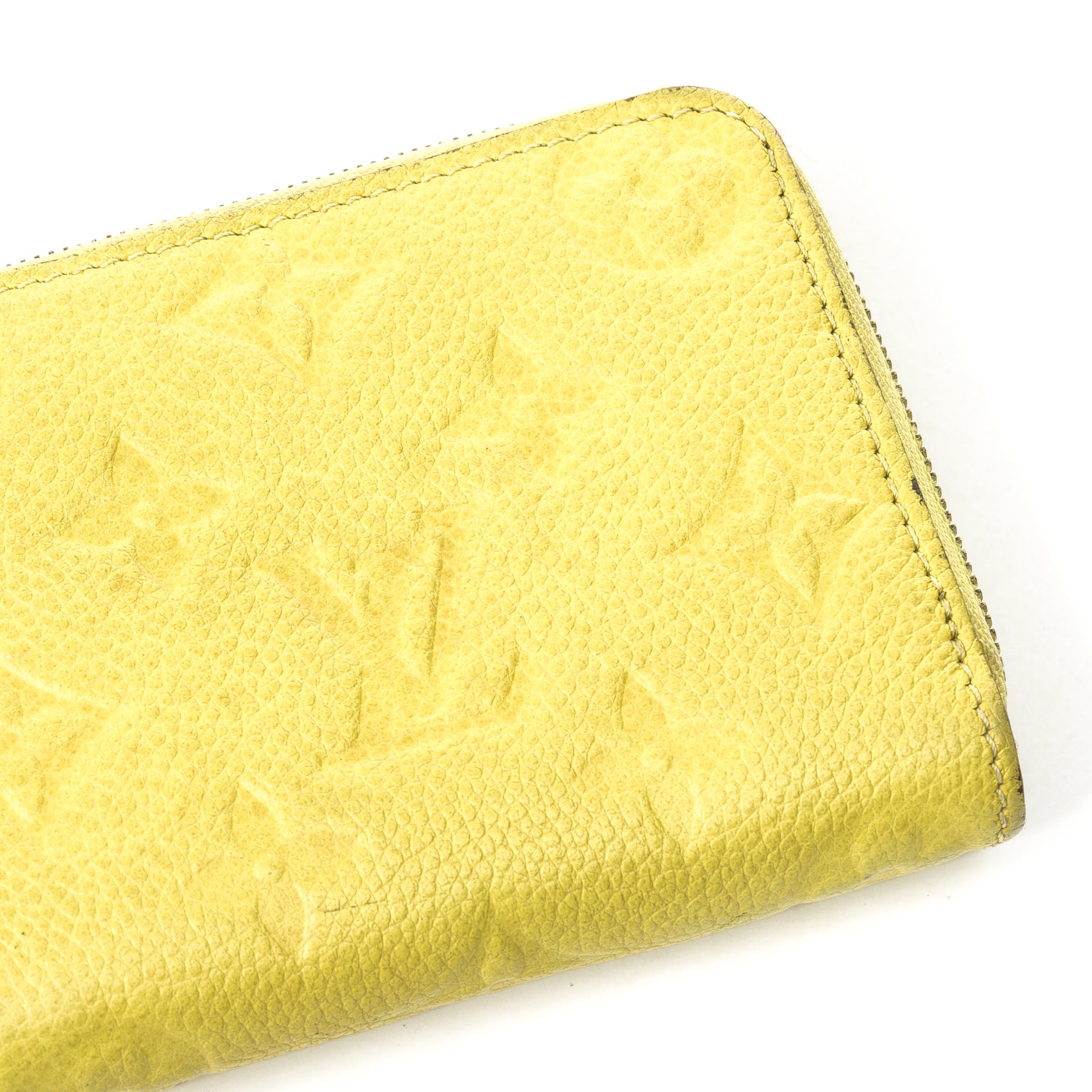 Zippy Yellow Wallet in Monogram Empreinte Leather, Gold hardware