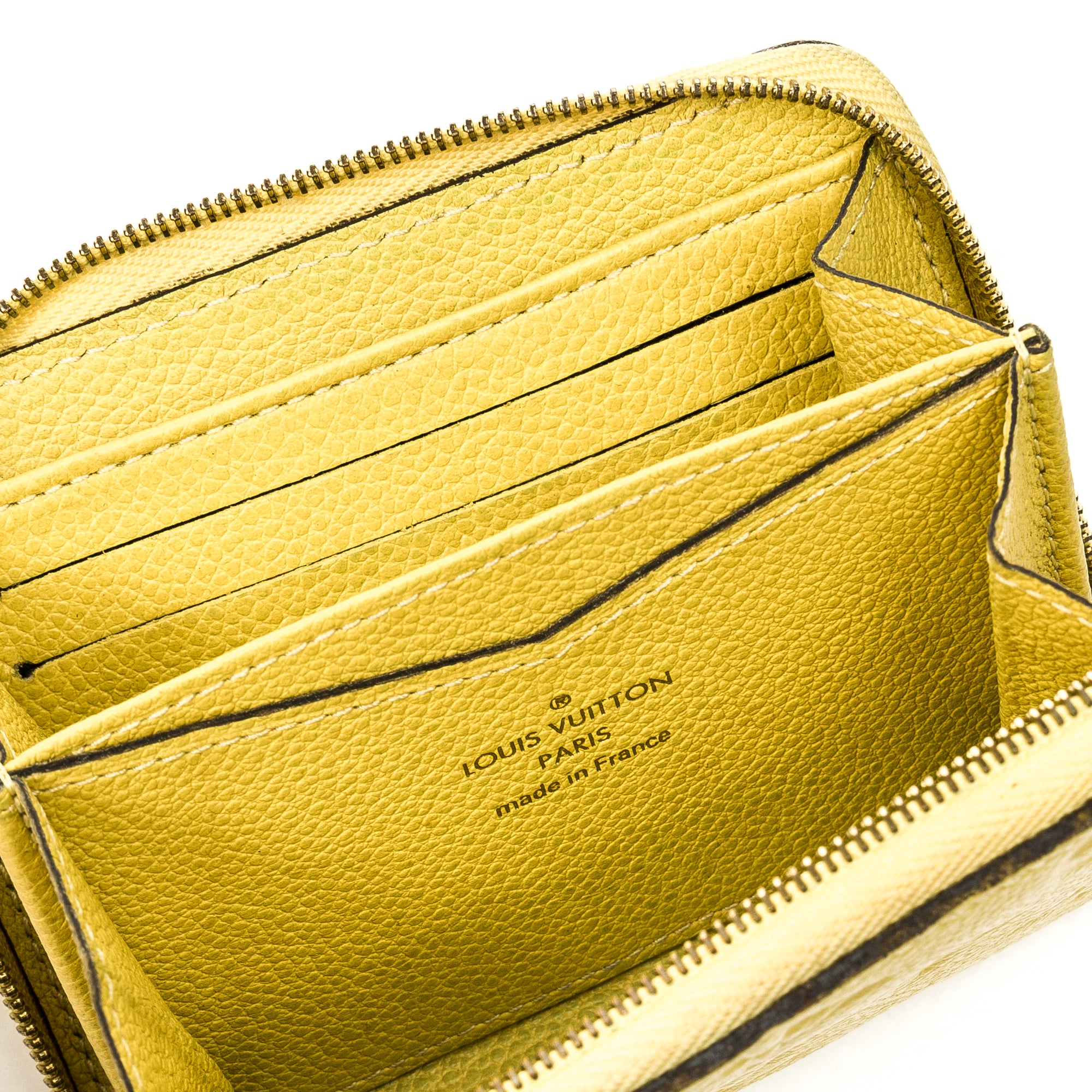 Zippy Yellow Wallet in Monogram Empreinte Leather, Gold hardware