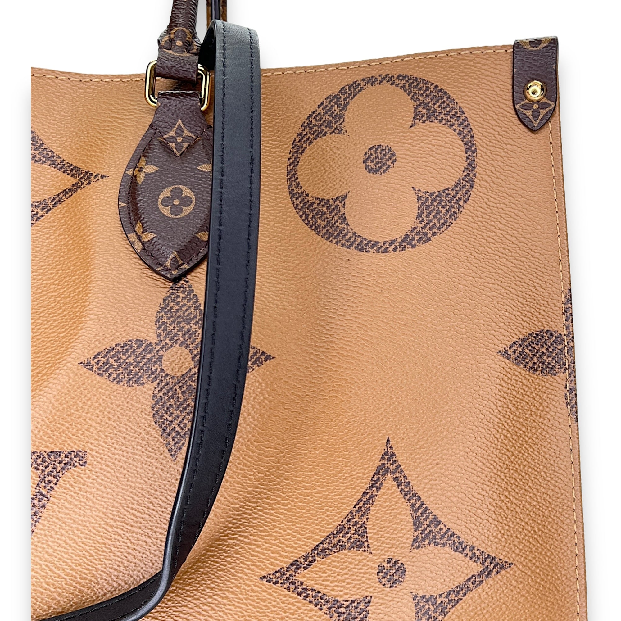 OnTheGo GM Brown Tote Bag in Monogram Coated Canvas, Gold hardware