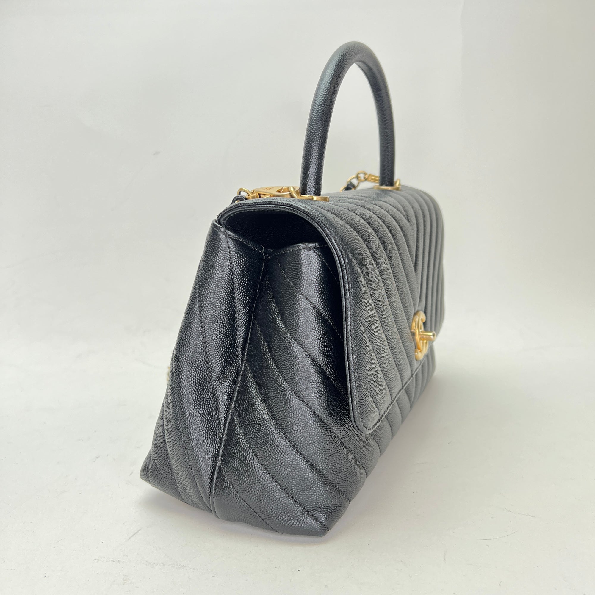 Coco Medium Black Top Handle Bag in Caviar Leather, Gold hardware