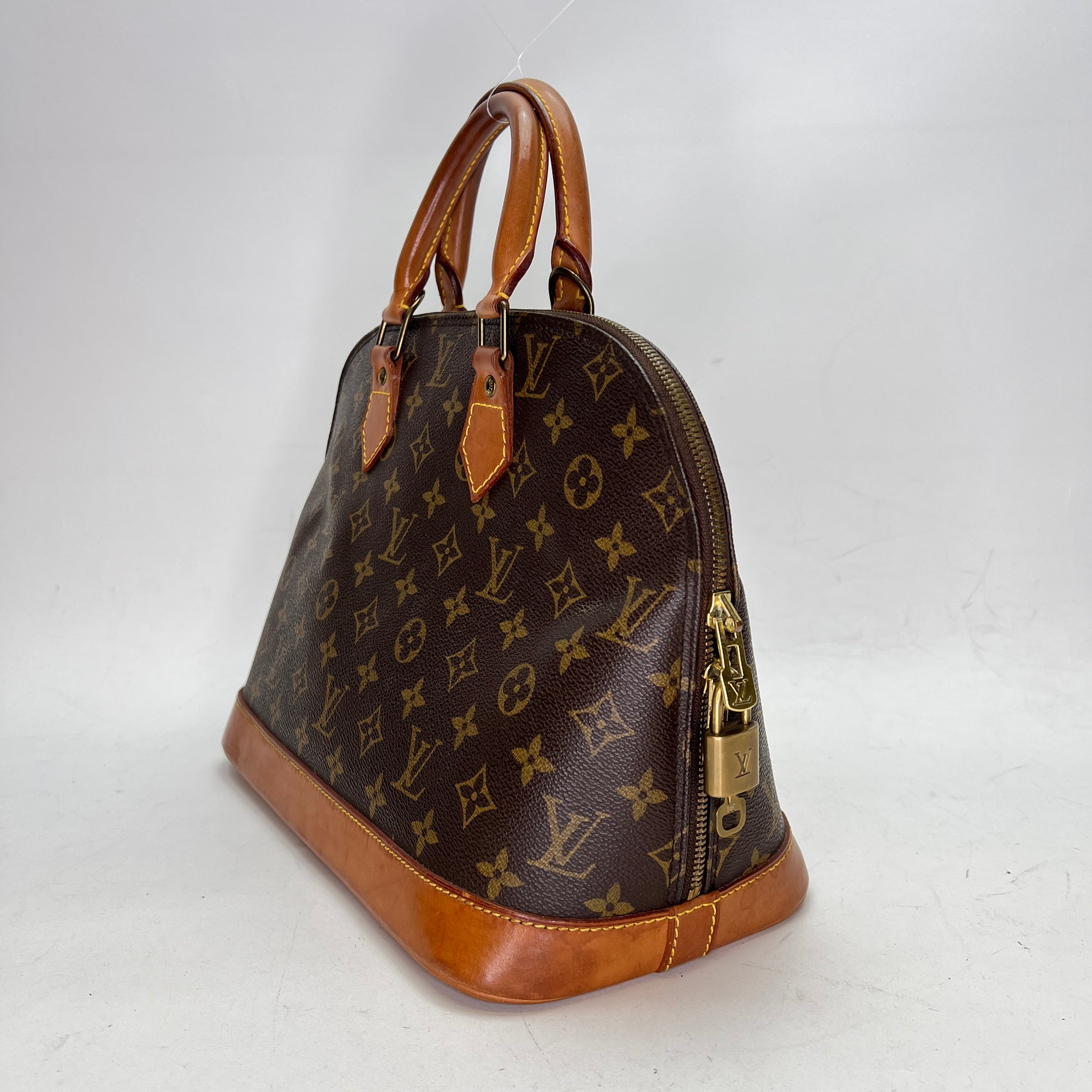 Alma PM Brown Top Handle Bag in Monogram Coated Canvas, Gold hardware