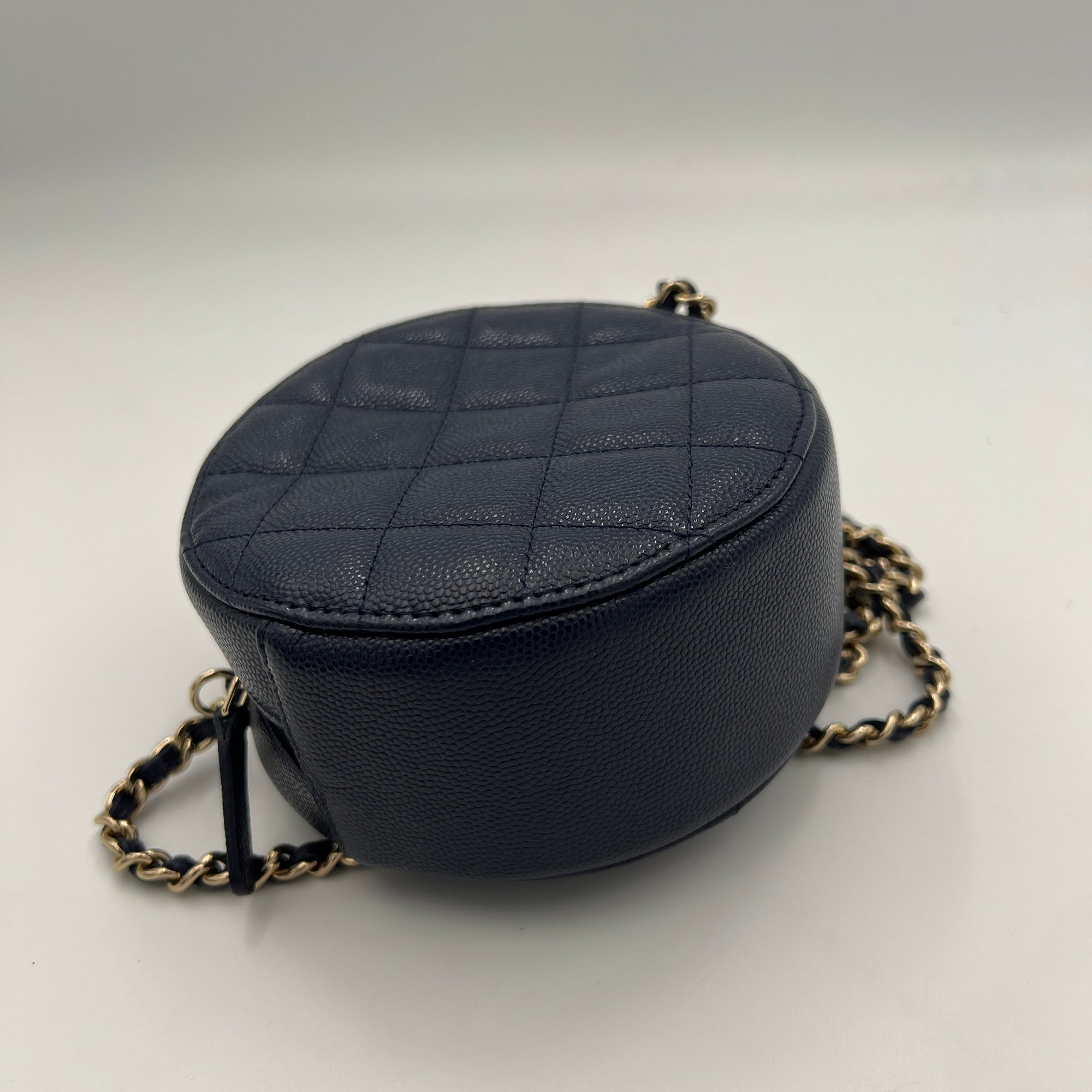 Classic Round Navy Crossbody Bag in Caviar Leather, Gold hardware