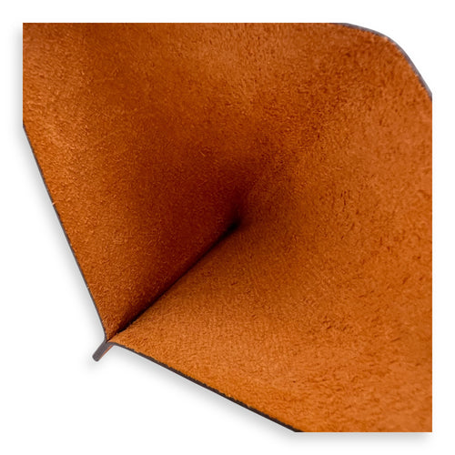 Others Orange in Epsom, Silver hardware