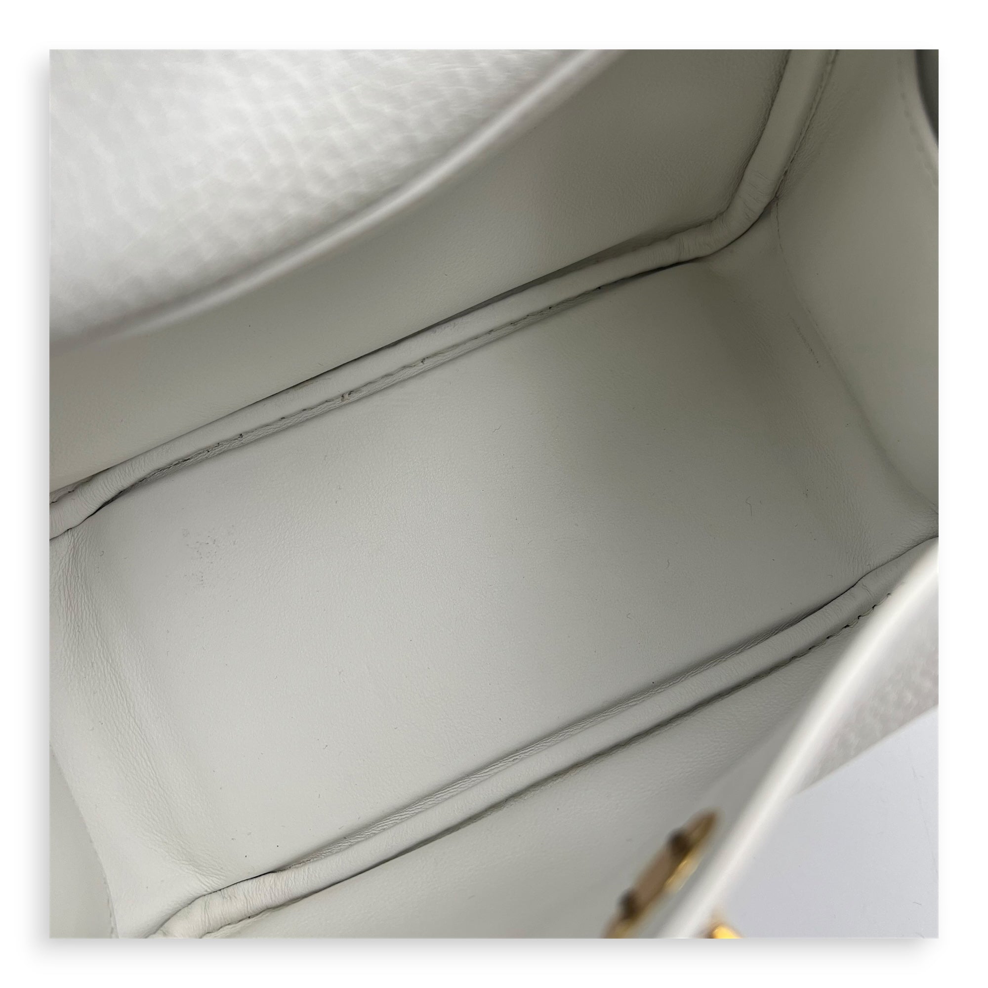 Lindy White in Clemence, Gold hardware