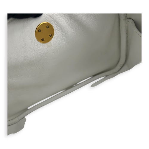 Lindy White in Clemence, Gold hardware