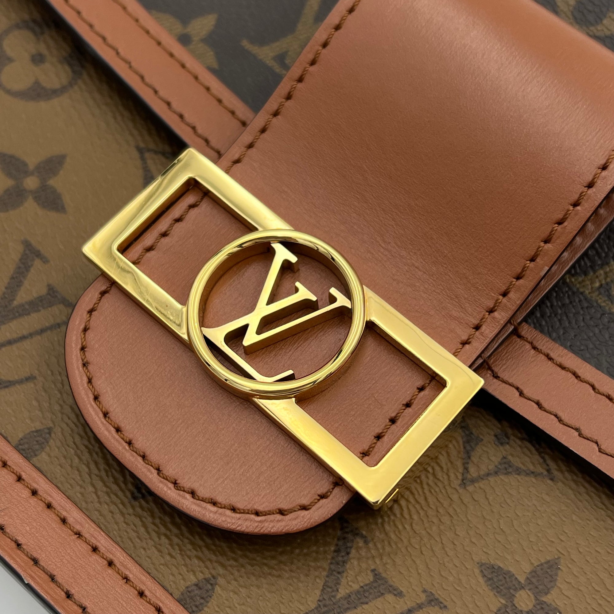 Dauphine MM Brown Shoulder Bag in Monogram Coated Canvas, Gold hardware