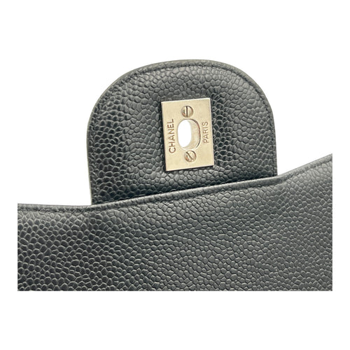 Classic Jumbo Single Flap Black Shoulder Bag in Caviar Leather, Silver hardware