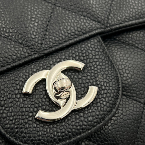 Classic Jumbo Single Flap Black Shoulder Bag in Caviar Leather, Silver hardware