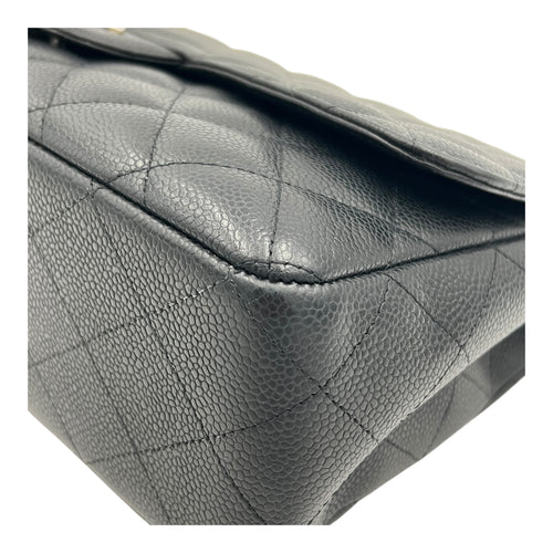 Classic Jumbo Single Flap Black Shoulder Bag in Caviar Leather, Silver hardware