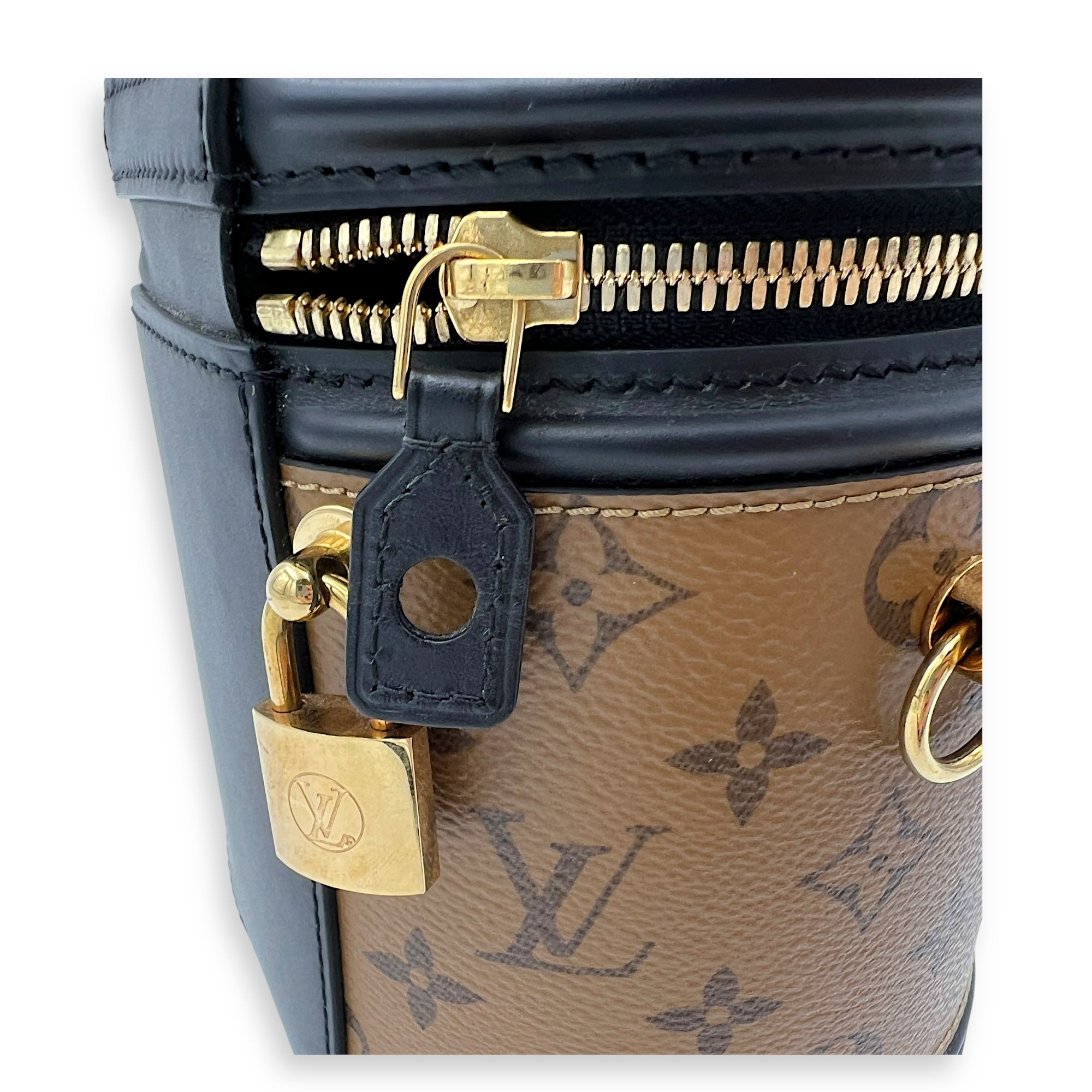 Cannes Brown Bucket Bag in Monogram Coated Canvas, Gold hardware