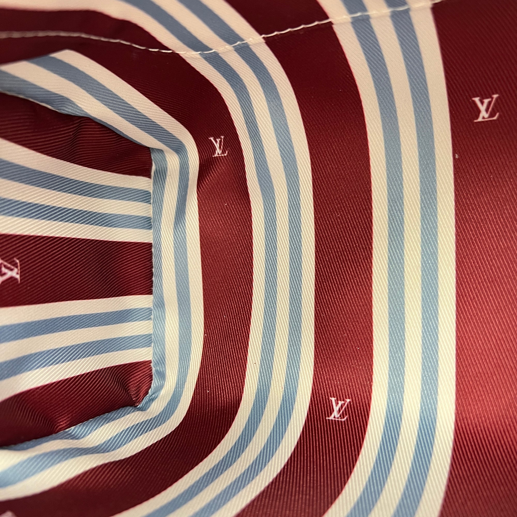 Heritage Keepall 25 Beige Top Handle Bag in Coated Canvas, Gold hardware