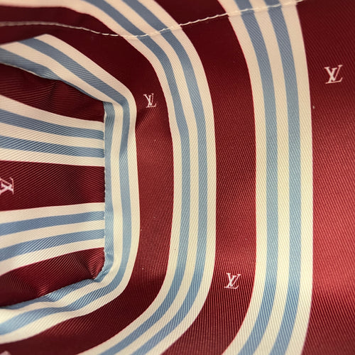 Heritage Keepall 25 Beige Top Handle Bag in Coated Canvas, Gold hardware