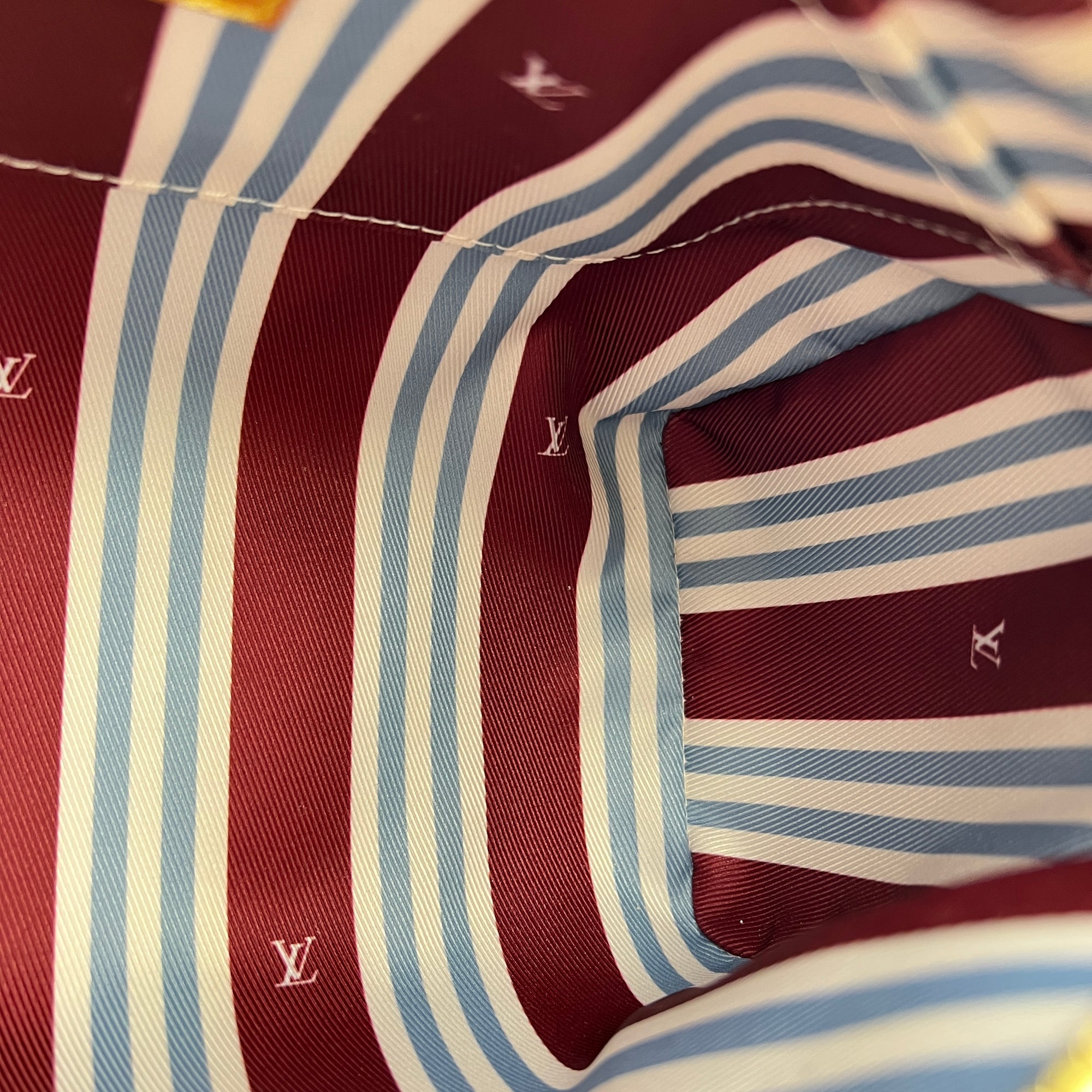 Heritage Keepall 25 Beige Top Handle Bag in Coated Canvas, Gold hardware