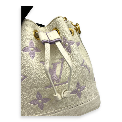 Noe Nano Bubble Tea Lilac/White Bucket Bag in Empreinte Leather, Gold hardware