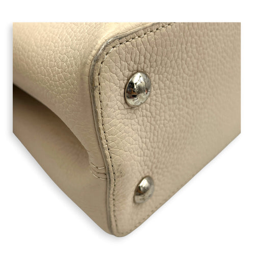 Capucines Top Handle Bag Beige in Taurillon Leather, Gold hardware