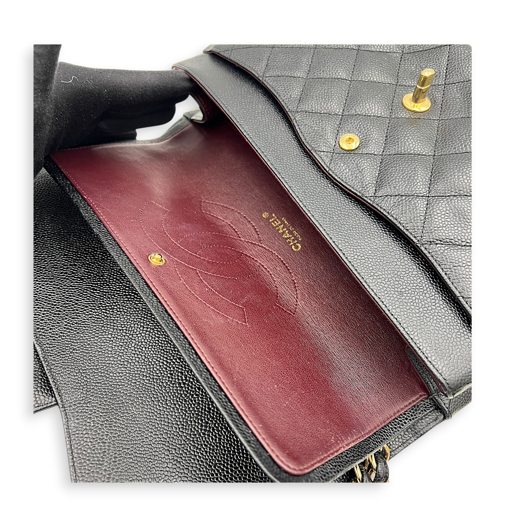 Classic Double Flap Crossbody Bag Jumbo Black in Caviar Leather, Gold hardware