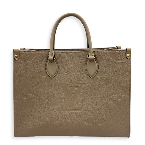 OnTheGo MM Beige Top Handle Bag in Empreinte Leather, Gold hardware