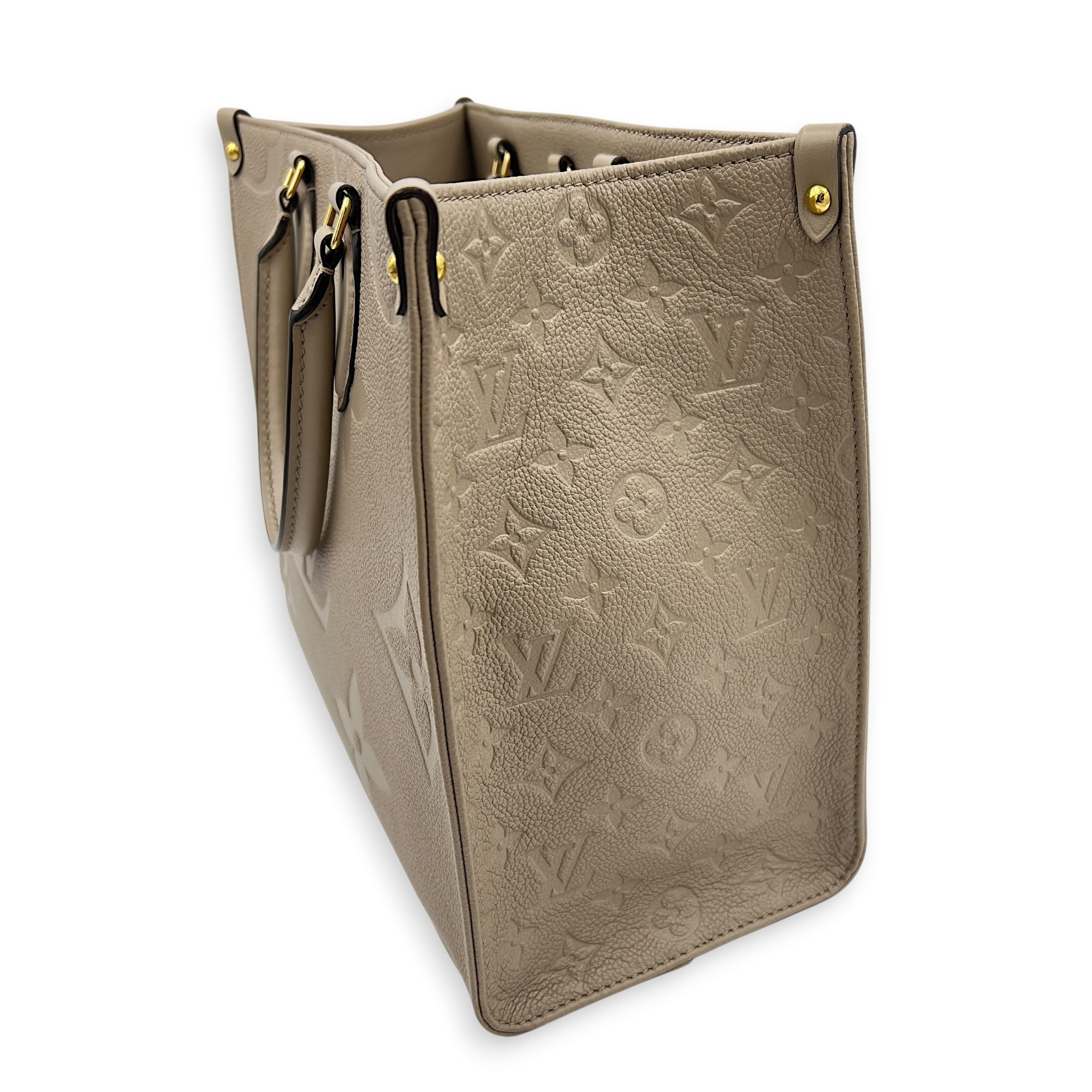 OnTheGo MM Beige Top Handle Bag in Empreinte Leather, Gold hardware