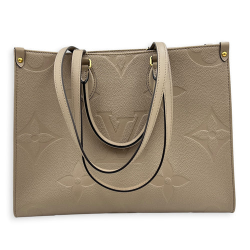 OnTheGo MM Beige Top Handle Bag in Empreinte Leather, Gold hardware
