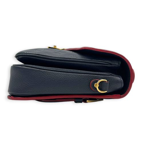 Pochette Metis Blue Top Handle Bag in Empreinte Leather, Gold hardware