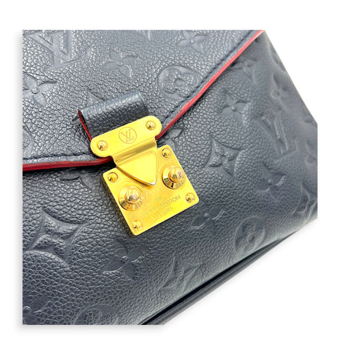 Pochette Metis Blue Top Handle Bag in Empreinte Leather, Gold hardware