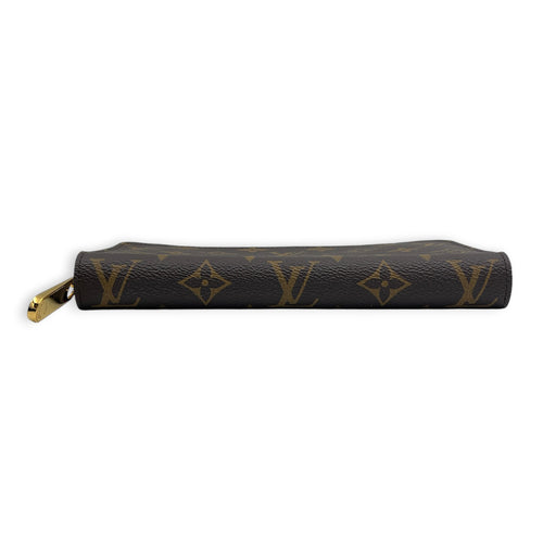 Zippy Wallet Monogram / Fuchsia in Monogram Coated Canvas, Gold hardware