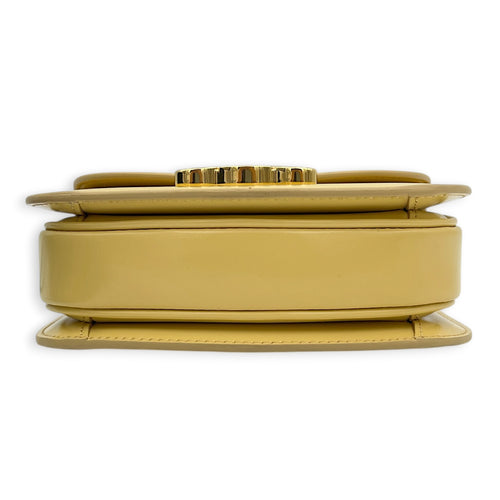 Triomphe Top Handle Bag Yellow in Calfskin, Gold hardware