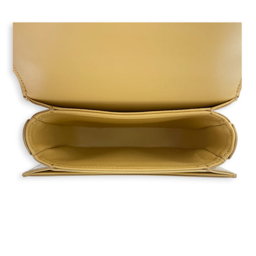 Triomphe Top Handle Bag Yellow in Calfskin, Gold hardware
