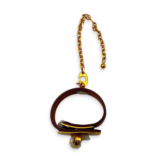 Kelly Brown in Swift, Gold hardware